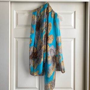 Brown flower on blue scarf